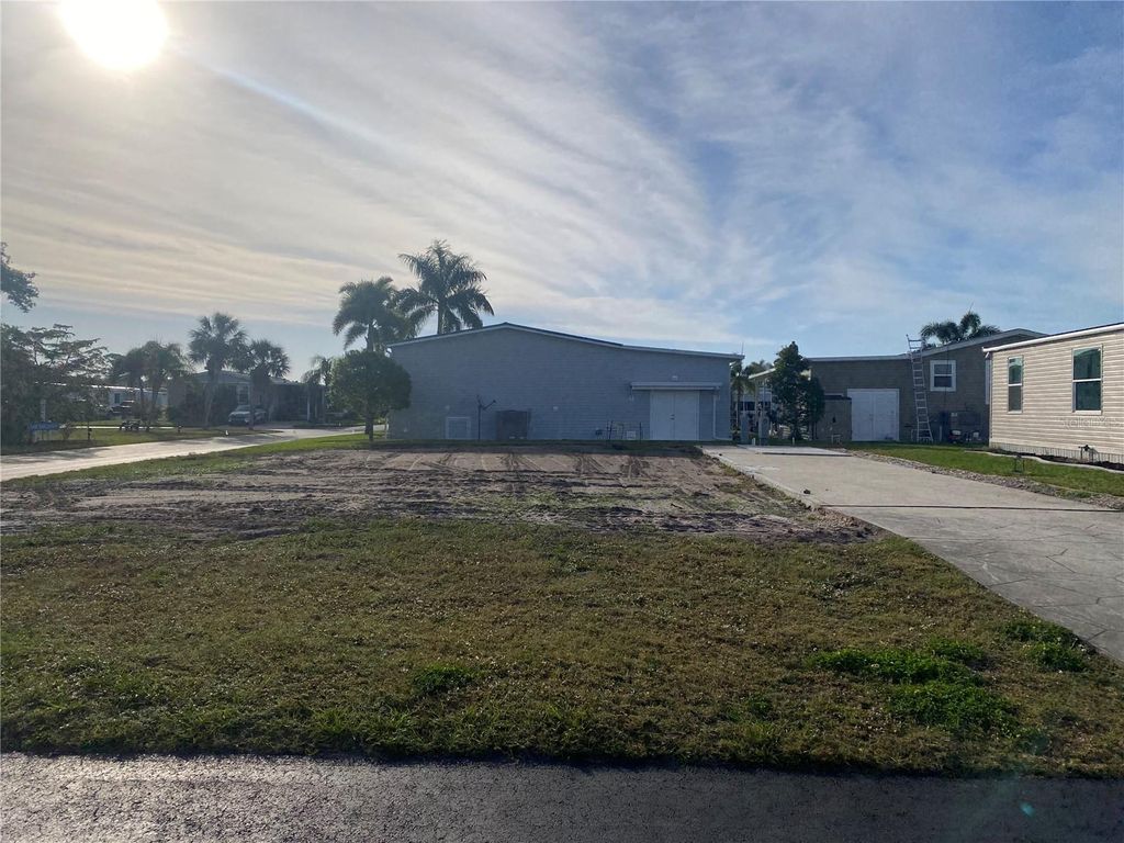 Photo of 301 La Costa, North Port, FL 34287 (MLS # T3526072)