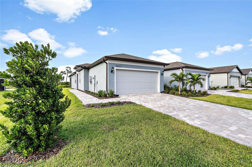Better than new, gently lived in Kendrick Villa in fabulous Del Webb at Bayview in Parrish. Come and see for yourself what everyone is talking about the new "Center of Everything." The development of this area is second to none with New Schools, Hospitals, Hotels, Shopping, Dining and Much More. Easy access to Sarasota, St. Pete & Tampa with 175 and 275 just minutes from the main gate. 
Homeowners live the life of true luxury with resort style amenities. Staying active with neighbors in this 55+ Community is a breeze with its Resort Style Zero-Entry Pool, Resistance & Lap Pool, Pickle Ball, Tennis Courts, Bocce Ball, State of the Art Fitness Center and Movement Studio. Driftwood Club House with its Coastal Casual elegance is a fantastic place to meet up with neighbors for a drink or dinner with outdoor or indoor dining. Connecting with neighbors is easy with the plentitude of activities available for all residents. Casual, easy, active, living is the vibe in this community.
Maintaining this new villa is a delight with its maintenance included neighborhood allowing homeowners more time for recreation. 
This squeaky clean, bright villa with its light cabinets & quartz countertops, luxury vinyl flooring, upgraded lighting, plantation shutters, custom shades, 8 ft. doors, office/ den combo and open floorplan is far better than new... MOVE IN READY with no dust or dumpsters on your street! Enjoy the beautiful wildlife on the lake from your enclosed, Lanai while sipping a cup of coffee or glass of wine at sunset. Come and live your best life in this fabulously active community in an area that is improving at the speed of light! Make an appointment to witness what you have heard about this area, you won't be disappointed.