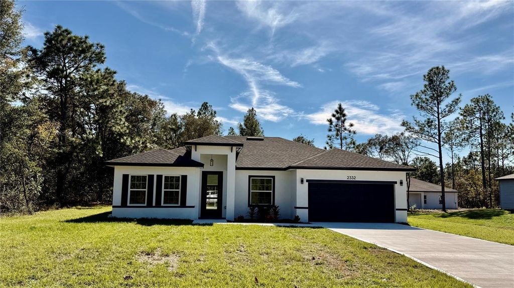 Photo of 2332 W Newhope Lane, Dunnellon, FL 34434 (MLS # O6360086)
