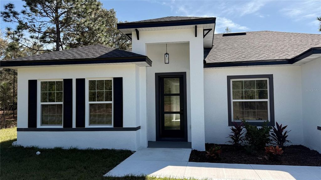 Photo of 2332 W Newhope Lane, Dunnellon, FL 34434 (MLS # O6360086)