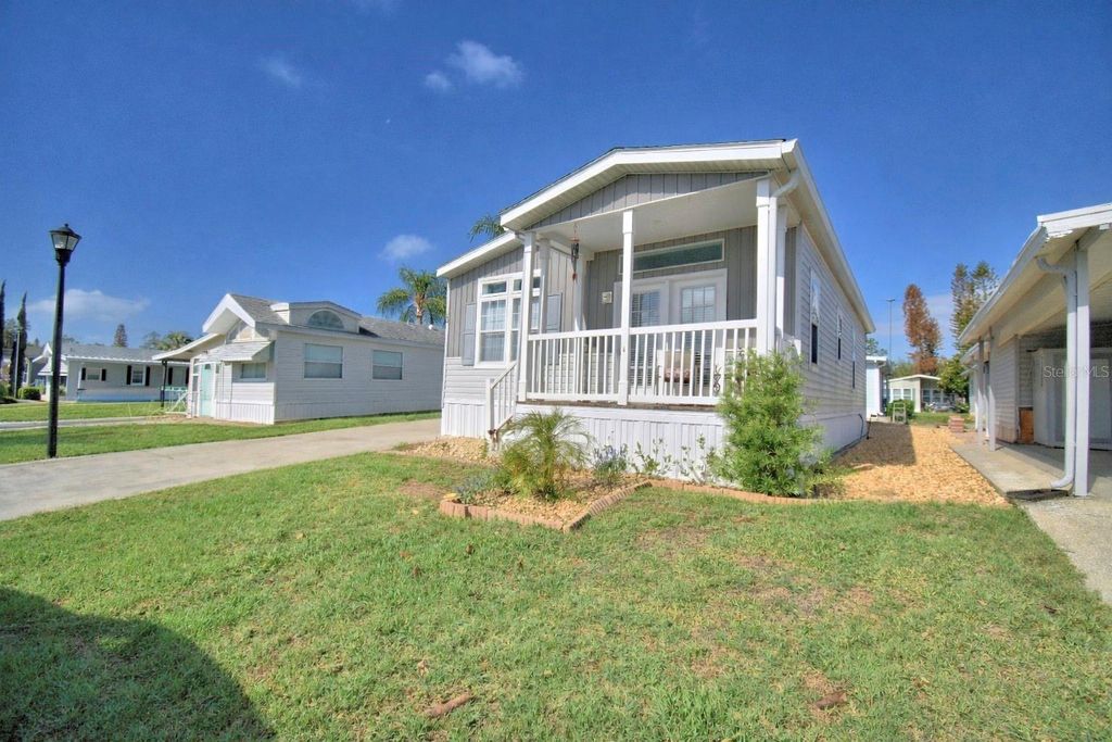 Photo of 4925 Cypress Gardens Road #100, Winter Haven, FL 33884 (MLS # P4938418)