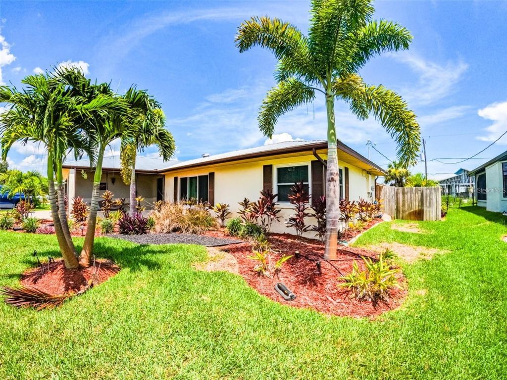 Photo of 945 Chevy Chase Street, Port Charlotte, FL 33948 (MLS # C7515784)