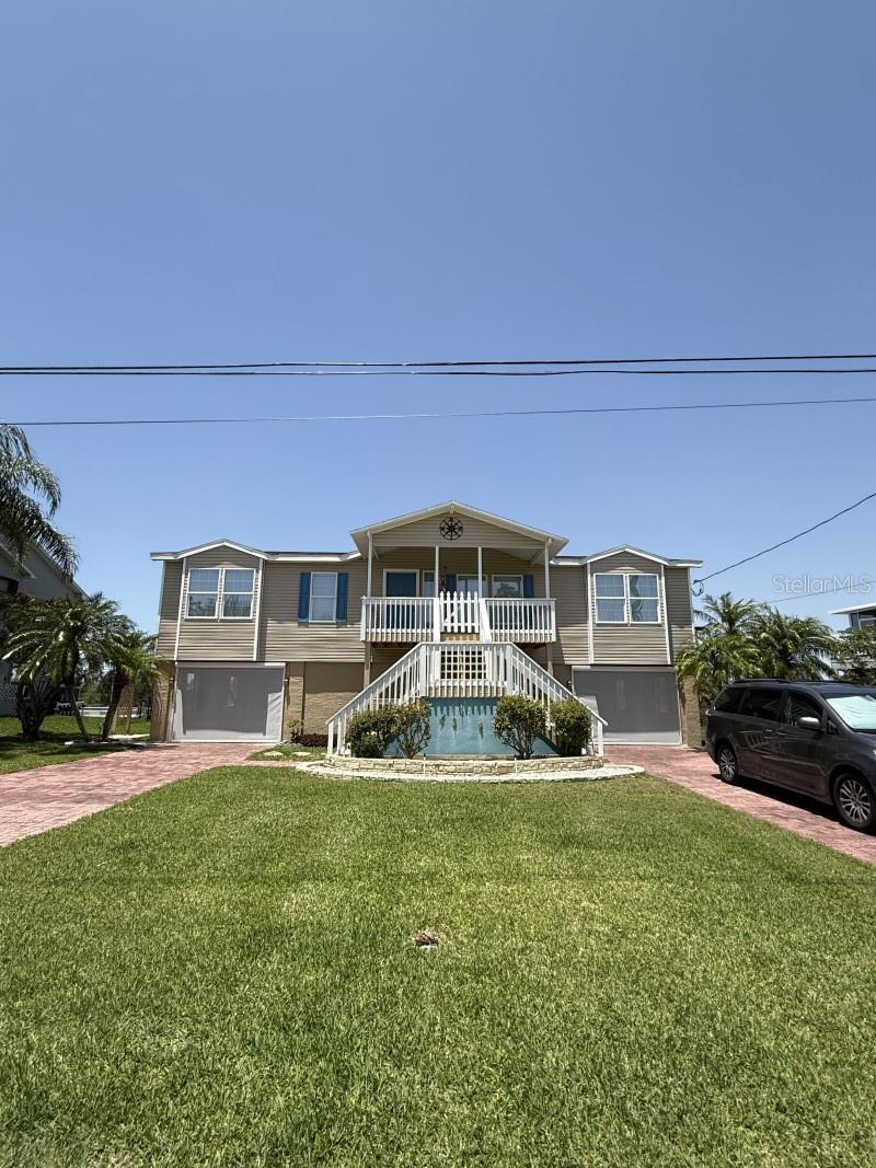 This beautiful stilt pool home sits on one of the most desirable lots in Hernando Beach. The back of this home faces north and is on Blue Heron Canal which borders natural wetlands. There is a great view of the wetlands and no across-the-cancel back door neighbors. Very few homes in Hernando Beach actually have a view of the Gulf. From this home you have a direct view of those famous and breathtaking Florida west coast Gulf sunsets.
Home is located in the Central section of Hernando Beach on a very quiet cul-de-sac. (No HOA). Central section canals are brackish water and separated from the North section by 1200 feet wide wetlands. Home has access to the Gulf through an easy to use and well maintained lift station.
This stilt one level home has 3 bedrooms 2 1/2 baths
Home has an enclosed outdoor elevator that goes from the main level to the lower level. Great for bringing in the groceries straight from the ground level garage to the kitchen.
All doors have keyless entry.
Finished lower level with Bathroom
Hardwood floors throughout main Level with exception of laundry room and 2 bedrooms which have LV flooring.
Large Family Room…(13’ x 25’) has windows facing the canal.
Living Room…15’ x 14’
Primary Bedroom…18’ x 15’
Bedroom 2…12’ x 11’
Bedroom 3…12’ x 11’
Two Car Garage, with large workbench area.
Double Paver Driveway
Garage doors with remote control.
Remote Control Skeeter Beater Garage Door screens, great for those breezy evening when you are enjoying entertaining in the lower area or just watching TV.
75’ Seawall with 30’ cantilevered dock
Large tiled screened pool area for entertaining.
Remote controlled Sun-Setter retractable awning on the lower level outside pool deck.
Fenced in back yard
Sprinkler system with new controller that can be controlled with your phone.
Set backs were changed via approved variances by Hernando County.
New approved set backs - Front 20’, Rear 10’(with variance)
Elevator Side 7’ (with Variance)
Home is ideal for those who enjoy boating, fishing, kayaking, and coastal waterfront living!!
Only a golf cart or short bike ride away from great places to eat or to just enjoy an evening out.
Also, this home would make a great investment and can be used as a short term rental property with no HOA restrictions.