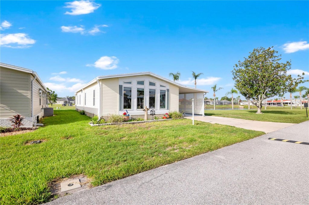 Photo of 707 Polo Park East Boulevard, Davenport, FL 33897 (MLS # L4963375)