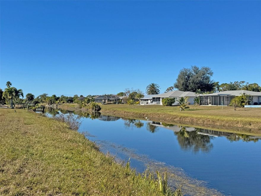 This charming, walkable neighborhood is surrounded by both new and mature homes and friendly neighbors. Clean and cleared lot 80 X 120 on a fresh water canal. Drink your coffee in the morning sun and towards the beautiful view of the canal. Build your dock and fish in your backyard and cruise the 20+ mile of connected waterways. It gets even better! City water and sewer and your future neighbors are already in place. Enjoy the sandy beaches nearby on Boca Grande or Manasota Key.
6 min drive to 6 different Golf Courses. Build your dream home or have a great investment! 
Welcome!