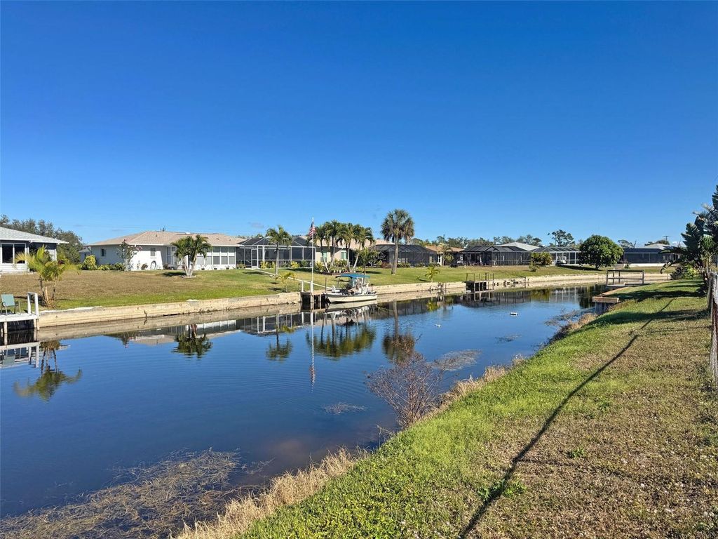 Photo of 151 Caddy Road, Rotonda West, FL 33947 (MLS # TB8462007)