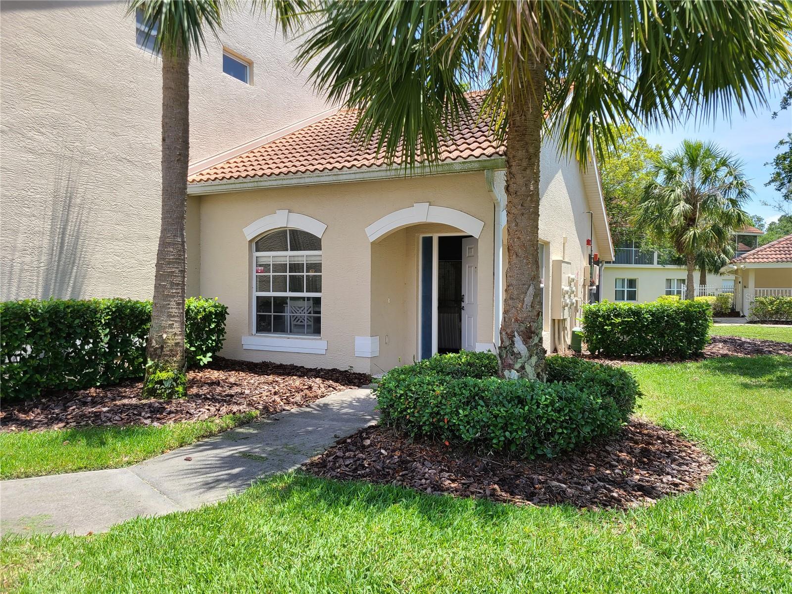 LOCATION, LOCATION, LOCATION. GOLF MEMBERSHIP IS NOT MANDATORY. Ground floor/End unit 2-bedroom 2 bath with attached 1 car garage. Ample guest parking. Literally steps away from heated community pool. Updated kitchen with stainless steel appliances and Corian counters. AC replaced 2020. Primary bathroom shower was updated with fiberglass shower to prevent mold. Super easy to clean. Laminate flooring thru out except the primary bedroom. Extra-large walk-in primary closet. Dual sinks. Freshly painted with coastal colors. Pocket door makes guest bedroom like a junior suite. Make this your second home. Golf membership is NOT mandatory. You can join if you like. You decide! Full access to Tara Preserve amenities including clubhouse, larger pool, tennis, pickleball courts and grill room. This condo comes with a REDUCED RATE as low as 6.750% (APR 7.171%) as of 5/21/2025 through List & Lock. This is a seller paid rate-buydown that reduces the buyer's interest rate and monthly payment. Terms apply, see disclosures for more information. Ask for the QR code for more details. HOA fee includes high speed internet, basic cable with multiple HBO channels. Easy access to I-75, State Road 70, area beaches, Sarasota/Bradenton airport, Lakewood ranch, UTC Mall and more. Call today for a showing. Easy to show.