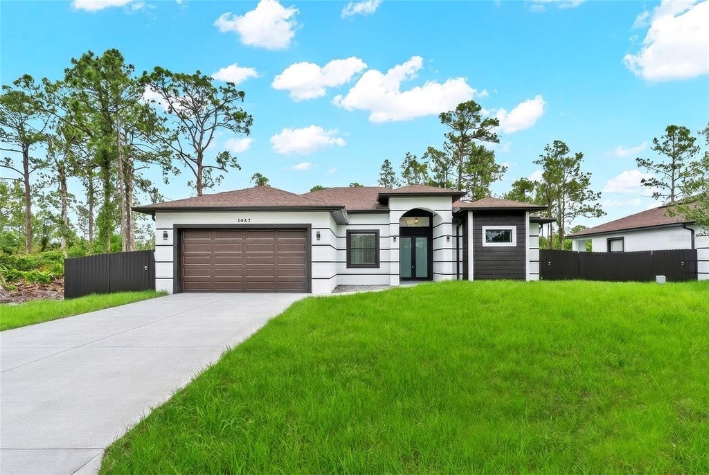 Photo of 1047 Merry Street E, Lehigh Acres, FL 33974 (MLS # A4703349)