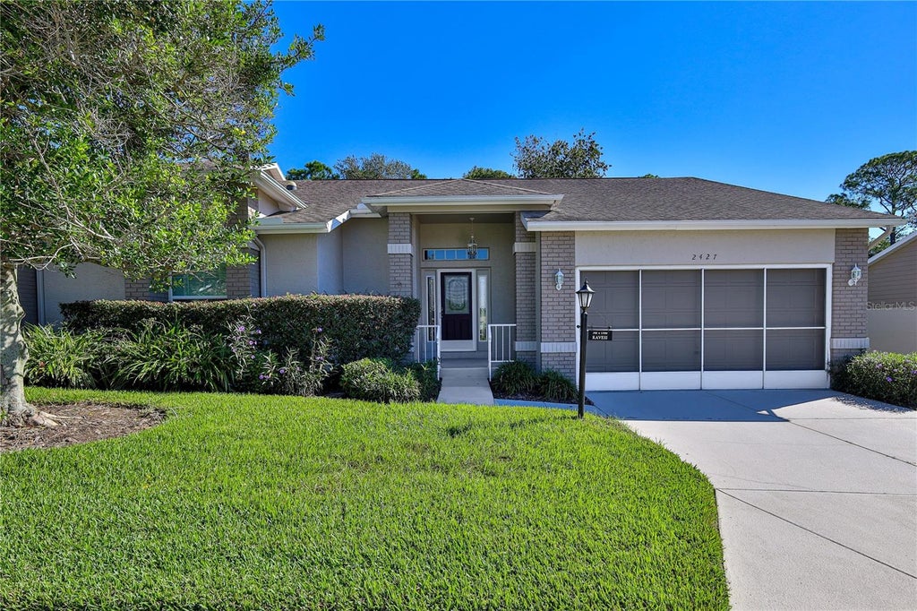 Photo of 2427 Hidden Trail Drive, Spring Hill, FL 34606 (MLS # W7890305)