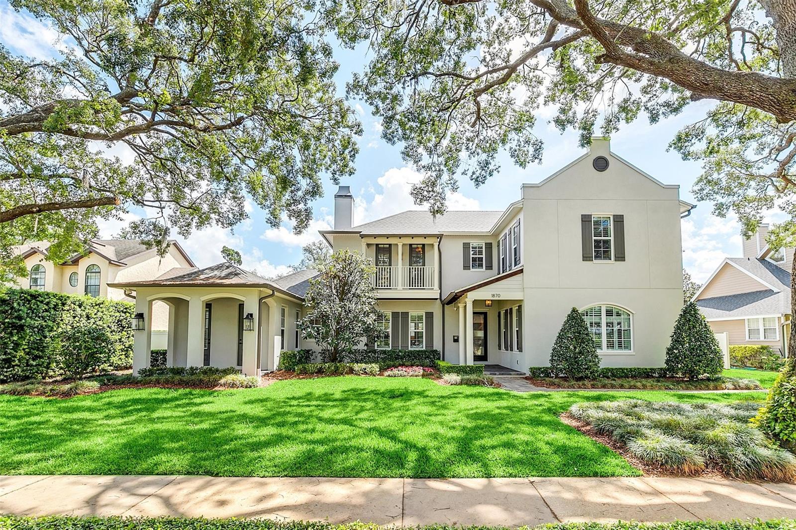 MULTIPLE OFFERS RECEIVED. Please present highest and best offer by Saturday 4/15 at 4pm. Located on a beautiful tree-lined brick street in Old Winter Park, this LunDev home was featured in the 2015 Parade of Homes and won for "Best Master Bath." The home features clean lines and a neutral color palette and is just a short stroll from Lake Virginia. With 4 bedrooms/4.5 baths, this 4,036 sq ft home is light and bright with a functional floor plan, perfect for work, relaxing or entertaining. This special home features a large great room with coffered ceiling and a stacked stone gas fireplace with surrounding lighted shelving. The chef's kitchen features granite counters, farmhouse sink, two-tone cabinetry, stainless appliances, induction cooktop, prep sink, walk-in pantry, center island and breakfast bar. Off the kitchen is a butler's pantry with wine refrigerator and cabinetry which flows to the large formal dining room. Adjacent to the kitchen is the eat-in area and the great room with 2 sets of French doors leading to the lanai. The primary suite offers a gracious ensuite bath with dual vanities, walk-in shower with a rain head and handheld shower, freestanding soaking tub, and marble floors. Located off the master bathroom is his and hers walk-in customized closet with ample storage for the discriminating shoe and purse collector. Also, on the first floor is an office with separate entrance, a half bath and the laundry room. The front staircase leads to a loft with a built-in beverage station and 3 ensuite bedrooms with spacious walk-in custom closets. Other amenities include 2 mud rooms, plantation shutters, engineered wood floors, crown molding, designer light fixtures, 9 security cameras, 2 tankless hot water heaters and a dog-washing station. The exterior features include an outdoor gas fireplace, summer kitchen, saltwater pool, and mature landscaping with accent lighting. A covered walkway leads to the detached 2-car garage with a split system AC and is equipped with a Tesla charger. Centrally located within minutes to downtown Winter Park, Baldwin Park and downtown Orlando. Zoned for Audubon K-8 and Winter Park High. Timeless transitional. Welcome home!