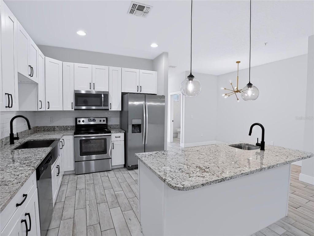 Photo of 2233 E Kaley Avenue #6, Orlando, FL 32806 (MLS # O6426448)