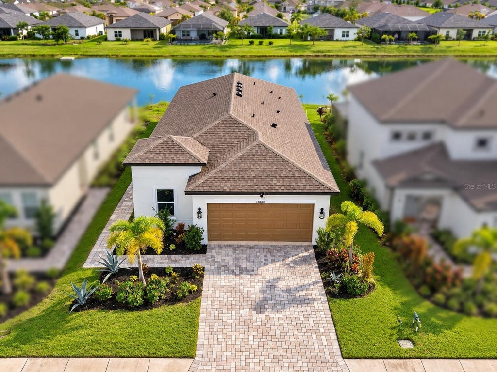 Photo of 16863 Sol Preserve Drive, Port Charlotte, FL 33953 (MLS # O6449147)