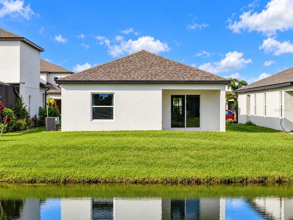 Photo of 16863 Sol Preserve Drive, Port Charlotte, FL 33953 (MLS # O6449147)