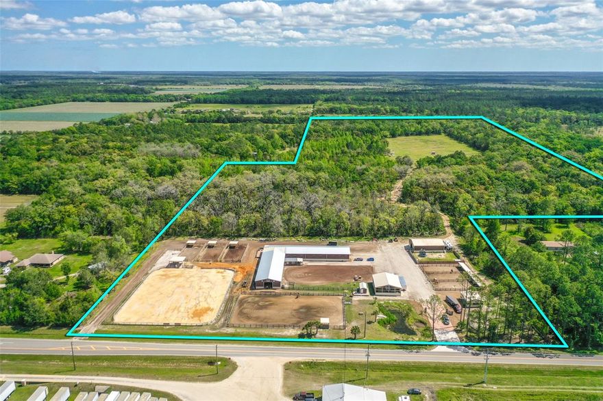 56 Acres Ranch in the heart of Flagler County. This property has everything you need to operate an equine operation, it is composed of 6 buildings, 7 large paddocks, 1 outdoor ring, and 7 acres field. It has been built over the last 2 years. Building 1 is Very large stall barn 6,400sqft with 14 stalls, 2 bathrooms, tack room, meeting room, feed room, bar, and an office. Building 2 is 4,800 sqft and is connected to building 1; currently used as inside arena, it has space for more stalls. Building 3 is a large shop of 2,400 sqft with a full bathroom, and an office room. Building 4 is a quarantine barn of 576 sqft, with 3 horse paddocks. Building 5 is a feed barn that was just added, to store hay bales and other feed. Building 6 is a 200 sqft pump house. The property has several septic tanks, and several 50 amp services for RV connection. All farm equipment is for sale as well, and can be negotiated separately.