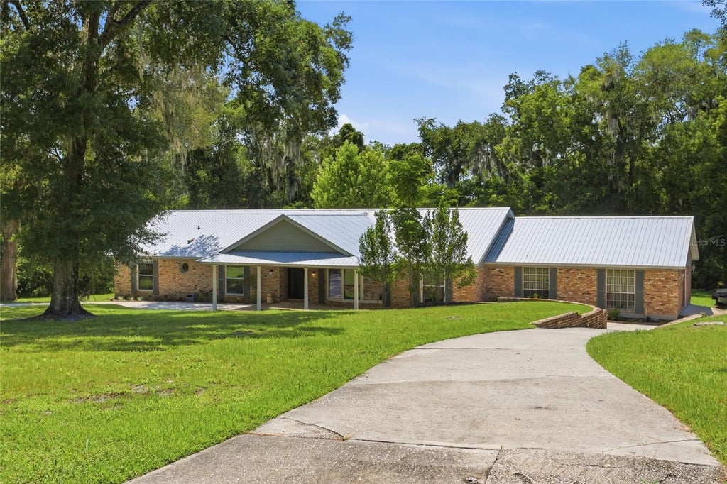 Photo of 1150 Markham Woods Road, Longwood, FL 32779 (MLS # O6432700)