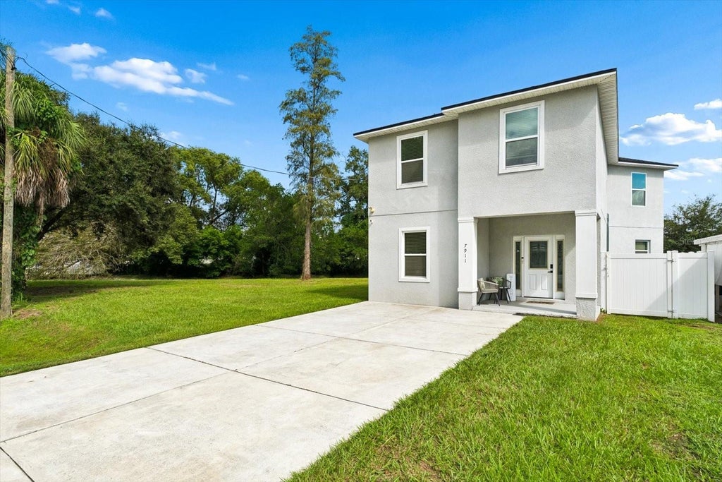 Photo of 7911 N Packwood Avenue, Tampa, FL 33604 (MLS # TB8560311)