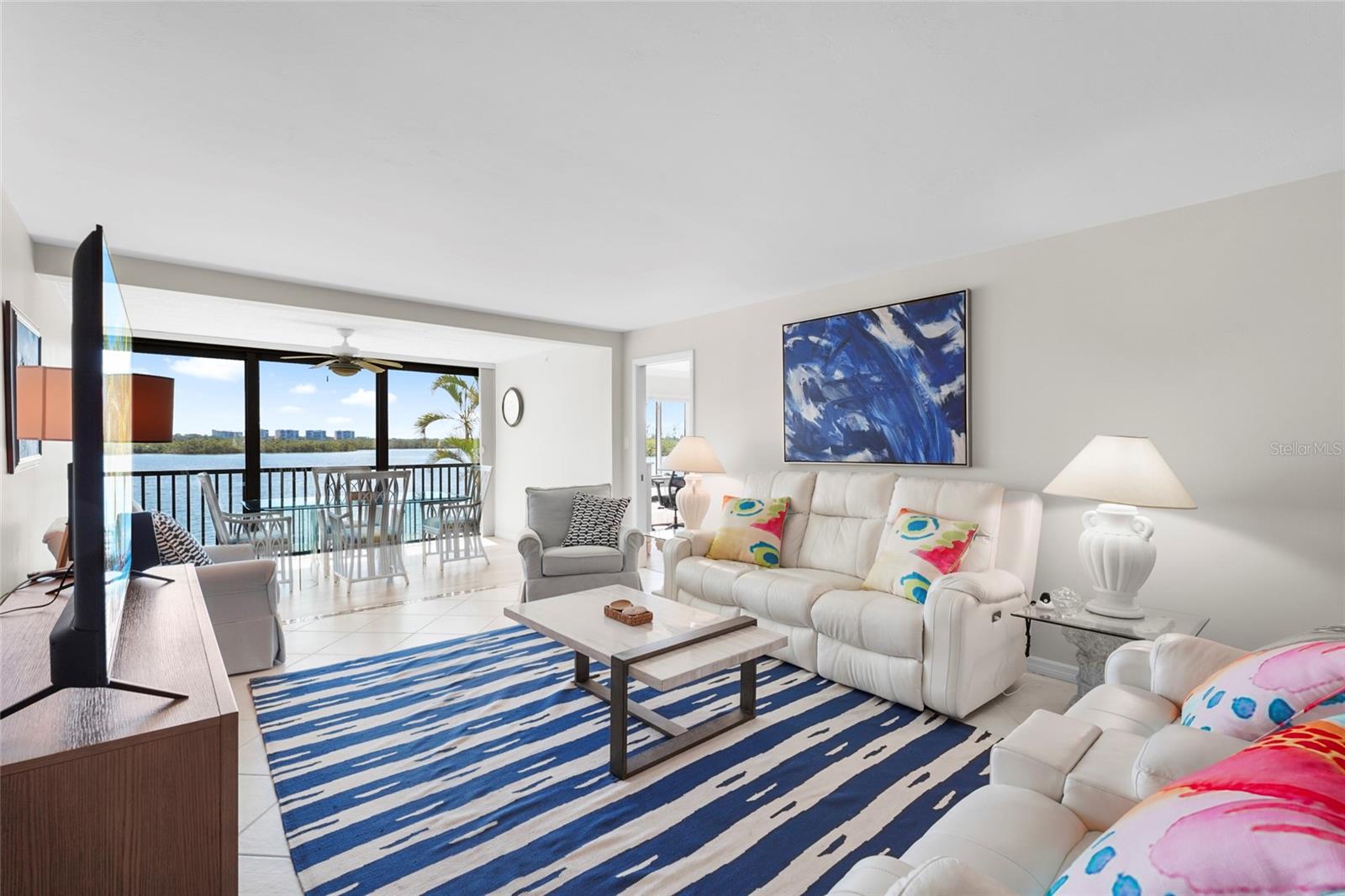 Welcome to Your Slice of Paradise at Sunrise Cove.
It starts with the light. From the moment you step into this rarely available second-floor end unit, you're greeted by an abundance of natural sunlight and sweeping views of the bay. With almost 1,400 square feet, this is one of the largest floorplans in the entire community.
Inside, you'll find tile and luxury vinyl flooring throughout, an in-unit washer and dryer, and a layout that lives large, whether you’re relaxing or entertaining. Offered turnkey furnished, it’s ready for you to drop your bags and begin enjoying the laid-back luxury of life on Siesta Key.
Start your morning with coffee overlooking the bay, then head across the street to Turtle Beach for a walk in the sand or a swim in the Gulf. If you're a boater, take advantage of available dock slips just steps from your door—ideal for quick access to Sarasota Bay and beyond. Prefer a paddle? There’s also a kayak launch ready for your next adventure.
Back at Sunrise Cove, the recently renovated clubhouse offers a stylish space to gather, complete with fitness center and social areas. Take a dip in one of two heated pools, meet friends for a match on the tennis or pickleball courts, and end the day with dinner at nearby favorites like Ophelia’s on the Bay or Turtle’s Restaurant, both within walking distance.
With a one-month minimum rental policy, Sunrise Cove provides a rare balance of income potential and residential charm. This is the kind of place that feels like vacation but lives like home.