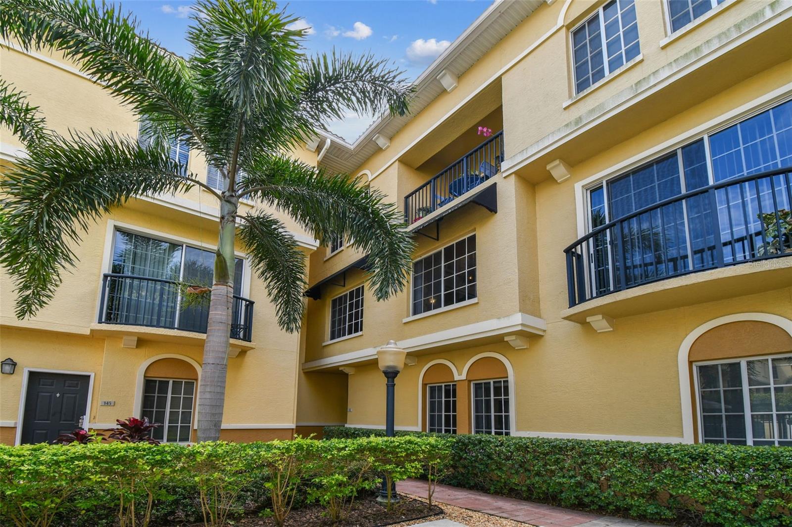 What a wonderful opportunity to own a spacious 3-bedroom, 3-bath luxury townhome in the highly sought-after Cordoba Beach Park and ideally located in Tampa’s popular Westshore and Plant High Schools District. This move-in ready residence combines timeless design, resort-style amenities, and an unbeatable location just minutes from everything in the Tampa Bay Area.
Welcome to Cordoba Beach Park, a beautifully maintained luxury community featuring a lavishly appointed clubhouse, a resort-style pool, a 24-hour fitness center with state-of-the-art cardio and strength equipment, and a business center. The HOA includes water, sewer, insurance, valet trash service, and full grounds and amenities maintenance, providing easy, worry-free living.
This stunning three-story townhome offers both functionality and sophistication.
The ground level features a welcoming front entry, an oversized two-car garage, and a bonus room ideal for a home office, gym, or den.
On the second floor, you’ll find an expansive open-concept living and dining area with vaulted ceilings, crown molding, and premium engineered hardwood flooring throughout. The chef-inspired kitchen boasts granite countertops, stainless steel appliances, ample cabinetry, and a generous breakfast bar—perfect for entertaining. Also on this level is the third bedroom with a full bathroom, offering flexibility for guests or multi-generational living.
The third floor showcases the luxurious primary suite, complete with a private ensuite bath, a walk-in closet, and elegant French doors opening to a serene balcony with tropical views of the lushly landscaped grounds and resort pool. The second ensuite bedroom on this floor features another spacious closet and an abundance of natural light.
This home is elevated and has never experienced flooding, offering valuable peace of mind in South Tampa. With fresh paint and stylish finishes, it’s truly move-in ready and designed for modern comfort.
Perfectly situated, Cordoba Beach Park places you minutes from Tampa International Airport, Downtown Tampa, Midtown, Westshore Plaza, International Plaza, and an array of fine dining and shopping options. Major highways, including I-275 and the Veterans Expressway, are just around the corner, providing easy access to St. Petersburg, Clearwater, and some of the most beautiful beaches in the country.
Experience the best of Tampa living in one of South Tampa’s most desirable luxury communities. This remarkable residence blends style, comfort, and convenience in an unbeatable location. Come see why Cordoba Beach Park is one of Tampa’s premier addresses—this home is truly a must-see!