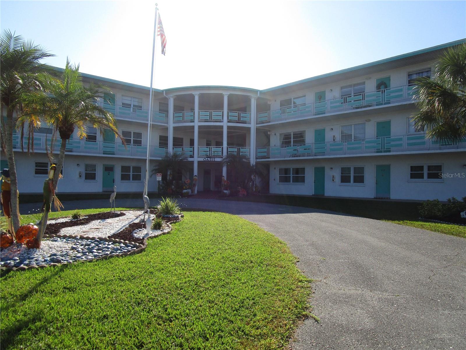 St. Pete's Best Kept Secret!  This condominium is gorgeous!  WATERFRONT! Furnished 2BR/2Bth 3rd Floor Condo in OASIS Building with beautiful views of the pond!  Completely remodeled in 2025!  Wood Laminate flooring in Living Room, Dining Room, Kitchen, Bedrooms, Hallway and Florida Room. Tile flooring in bathrooms. Custom Kitchen with Granite Countertops, Newer appliances including Gas Stove, Dishwasher, Refrigerator, Microwave and Disposal. Crown molding in Living Room and Dining Room. New light fixtures and ceiling fans, new bathroom fixtures and toilet, all new door levers and hardware and finished Florida Room. Master bathroom with walk-in shower. Carport parking right out back! Front entry has beautiful gardens for your relaxing enjoyment. Monthly maintenance of $671.56 includes gas heat & stove, water & sewer, internet & cable tv, trash removal, exterior maintenance, insurance, security & management. Extremely affordable living! This community has it all. Heated swimming pool, Recreation Center and Clubhouse, shuffleboard, cornhole, horseshoes, card games, Activities Club plus much more. Very well-maintained community and convenient to shopping, restaurants, etc. and on bus line. Minutes away from airports, interstate highways and Downtown St. Petersburg. No leasing; pets with appropriate documentation! 55+
