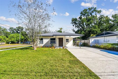 Photo of 8325 N Orangeview Avenue, Tampa, FL 33617 (MLS # TB8449500)