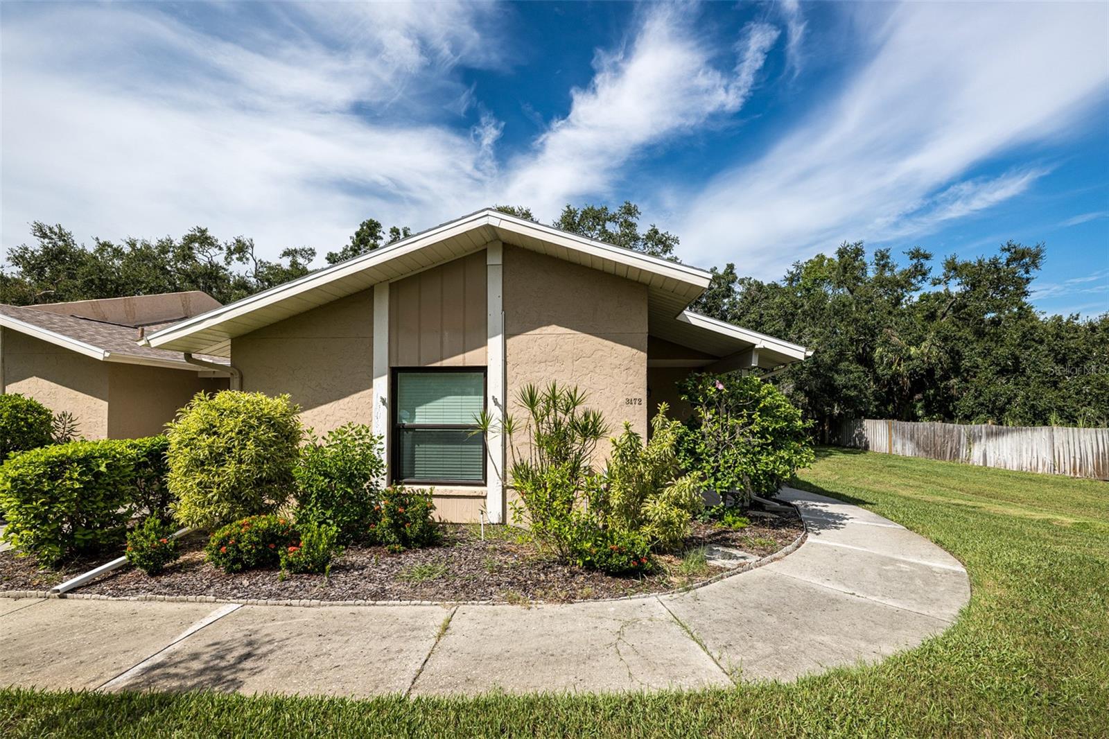Come see this beautifully maintained 2-bedroom, 2-bathroom home in the highly desirable, vibrant 55+ pet-friendly community of Tallywood! Step inside to an inviting open floor plan with vaulted ceilings, creating a bright and spacious feel. The split-bedroom layout offers privacy and comfort, while the additional bonus room can easily serve as an office, den, or even a guest room! This home is well cared for and features a brand-new 2025 HVAC system and water heater along with newer appliances. Convenient indoor washer and dryer included! Set within a 25-acre community surrounded by beautiful trees and nature, Tallywood offers a peaceful retreat with an active lifestyle. Tallywood provides wonderful amenities, including a clubhouse, pool, exercise room, library, shuffleboard courts, barbecue grills, picnic areas, and a dog park! All of this just minutes from award-winning beaches, downtown Sarasota, top-rated restaurants, UTC Mall, and more! Don’t miss this opportunity! Schedule your showing today!