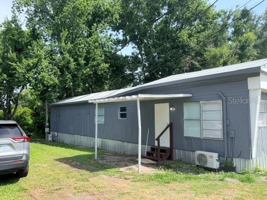 Fully remodeled property located in Union Drive Manufactured Housing Community. This versatile property features 2 bedrooms, 2 bathrooms, and a flexible layout designed to provide privacy and multiple living possibilities for shared occupancy, guests, extended family, or independent use of the spaces. Features include an updated main kitchen, additional wet bar/kitchenette area, new roof, modern mini-split AC systems, updated flooring, fresh interior and exterior paint, and move-in ready condition throughout. The layout offers excellent flexibility for those seeking privacy, functionality, and creative use potential of the property. Conveniently located near I-4, shopping, dining, and major Lakeland routes. Lot lease community with park approval required.