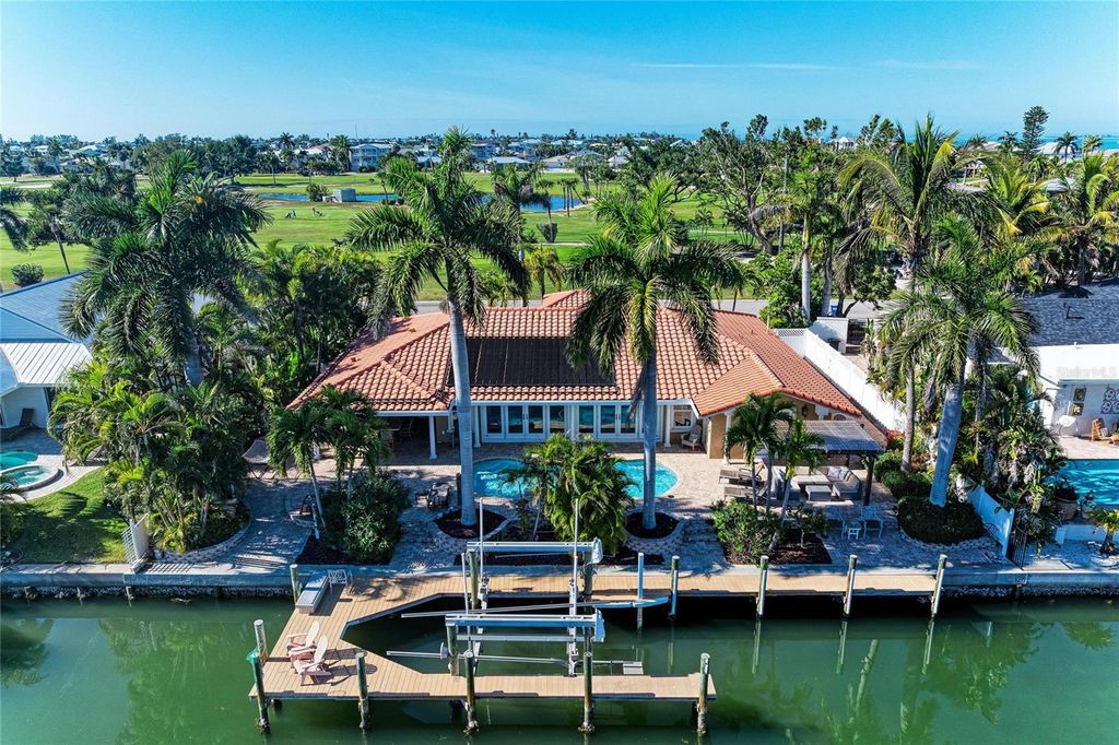 Photo of 608 Hampshire Lane, Holmes Beach, FL 34217 (MLS # A4676809)