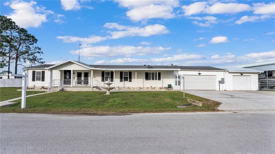 Welcome to your dream waterfront oasis! This stunning 3 bedroom, 2 bathroom home boasts over 200 feet of canal frontage, leading directly to the serene Mud Lake. Situated on an oversized 0.60 acre lot spread across 3 parcels, this property provides ample space and privacy, and the best part? No pesky HOA to restrict your creativity!

Step inside and be amazed by the meticulous upgrades and thoughtful renovations that have been lovingly implemented by the current owners. Starting from the top, the architect shingle roof was newly installed in 2018, ensuring many worry-free years ahead. The HVAC system was completely replaced in 2019, guaranteeing optimal comfort in every corner of the home, no matter the season.

As you traverse the new waterproof laminate & carpet flooring, you'll appreciate the modern, clean aesthetic that seamlessly flows throughout. The kitchen dazzles with its stainless steel appliances, which effortlessly complement the updated cabinetry and countertops. Picture yourself whipping up culinary masterpieces while enjoying sweeping views of the canal.

The double pane windows not only enhance energy efficiency but also allow natural light to flood every room, creating a warm and inviting atmosphere. The plumbing has been completely updated, ensuring peace of mind for years to come. The chain link and vinyl fencing provide privacy and security, while the addition of a telescopic flagpole adds a touch of patriotic charm to the property.

For those with a passion for cars and recreational vehicles, you'll appreciate the insulated 3-car garage space boasting a new garage doors with plenty of space for storage and projects. Additionally, the new RV carport with a concrete floor and 50 amp outlet offers convenience and peace of mind for all your outdoor adventures.

After a long day, immerse yourself in pure relaxation in the professionally installed saltwater hot tub, situated on the enclosed back porch that were both added in 2022. Unwind as you soak in the breathtaking views of the canal, knowing that your electric panel was also newly replaced in 2021, ensuring safety and efficiency all year round.

But the features don't stop there. This home is truly a haven for entertainment, with a 4k crystal clear theater system complete with a retractable projection screen for an unforgettable movie night experience. Say goodbye to dead spots and unreliable Wi-Fi, as this property comes equipped with a mesh router, ensuring solid internet service throughout the home. And with the bonus of a partially furnished space, you can move right in and start enjoying your new lifestyle immediately - just ask for the list of included items.

The owners have left no stone unturned, having updated not only the kitchen and bathrooms but also the master bedroom, office, living room, and family room. The addition of a stunning pallet accent wall adds character and charm, making this house truly feel like a home. The backyard shed provides additional storage, while the dock with nearby electric is perfect for those seeking a tranquil spot for fishing and relaxing with friends and family.

With so much to offer, it's impossible to list every incredible feature. Come and see for yourself the beauty and tranquility that awaits you in this waterfront gem. Don't miss out on the opportunity to make this your forever home. Call now to schedule a private tour!