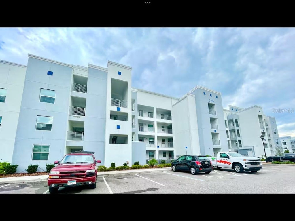 Photo of 3120 Paradox Circle #101, Kissimmee, FL 34746 (MLS # O6439562)