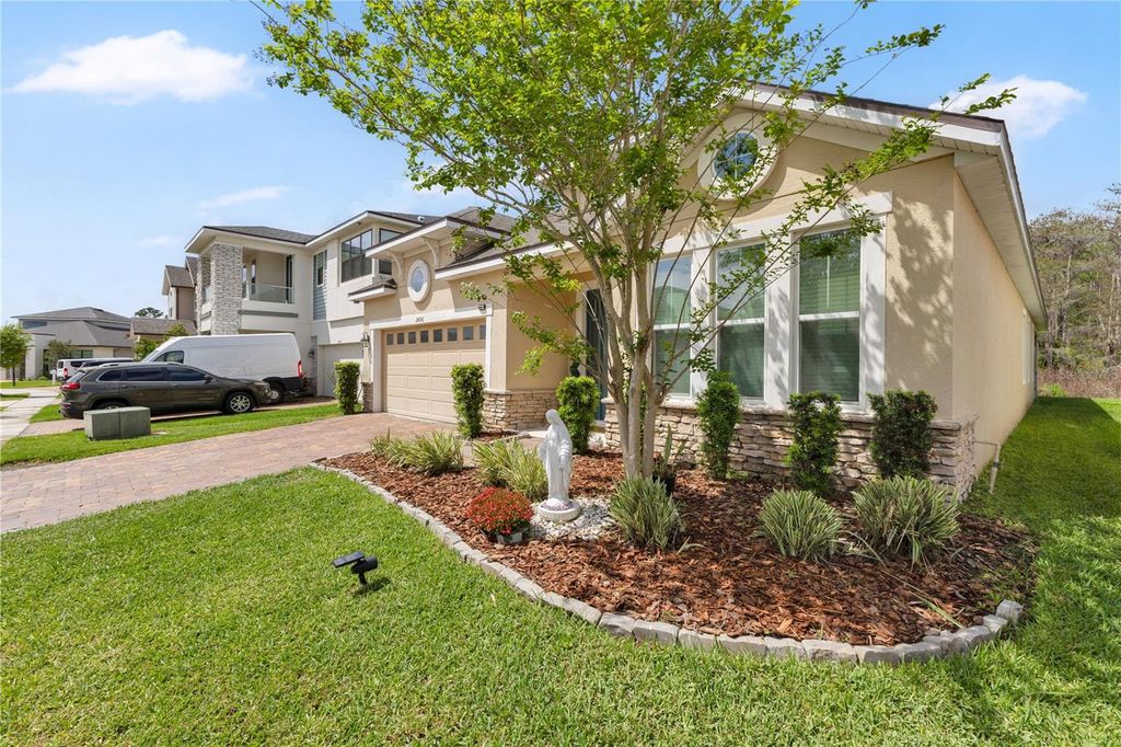 Photo of 2436 Varenna Loop, Kissimmee, FL 34741 (MLS # O6396410)