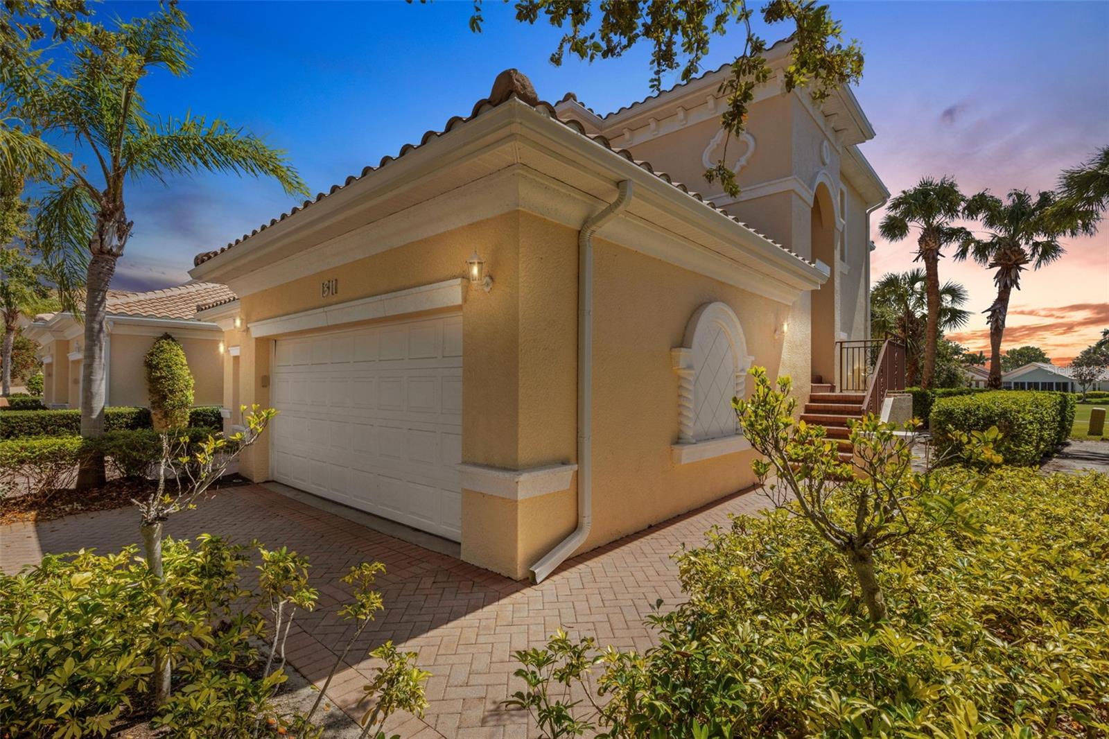 What a fabulous find! Turnkey furnished, 3 Bedroom, 2 Bath condo with over 2000 Sq Ft. and a 2 car garage. It's hard to beat that. Wait - it comes FURNISHED with Key West/Tommy Bahama style furnishings. All very tasteful and lightly used. You will just love the spacious and luxurious feel when you enter the main living space. The high ceilings and tall windows overlooking the neighboring golf course make the large Great Room feel like it goes on forever. GOLF COURSE VIEWS without golf course prices. Entertaining is a breeze here with all of that space and the large Kitchen with tons of counter space and breakfast bar. There's a separate Dining Room for formal meals and another more informal dining space that's part of the Great Room. The Bedrooms and Baths are all generously sized with good closet space in the bedrooms and throughout the condo. There is a linen closet for both baths. The third Bedrooms is currently used as a Den/Office. The Laundry Room is on the main living level and has extra storage space there as well. Recent improvements in 2024 include NEW TILE ROOF, NEW GUTTERS, NEW EXTERIOR PAINT. Clubhouse, fitness center and a community pool with a gorgeous tropical rock waterfall complete the picture. This is a very special community with beautiful, mature landscaping. All this a fabulous LOCATION too! Close to the new state-of-the-art Sarasota Memorial Hospital recognized among the world's best hospitals. Two miles from Downtown Venice Avenue for shopping, dining and all kinds of entertainment. Close to Venice and Nokomis Beaches and Venice Fishing Pie, a short drive the Sarasota to the North, Wellen Park and Punta Gorda to the South. Mere minutes from the closest Publix shopping center and I75.