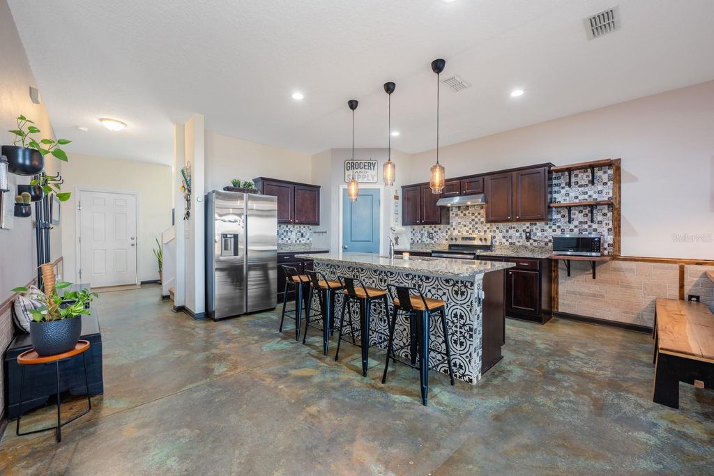 Photo of 16434 Winding Blossom Drive, Groveland, FL 34736 (MLS # O6381402)