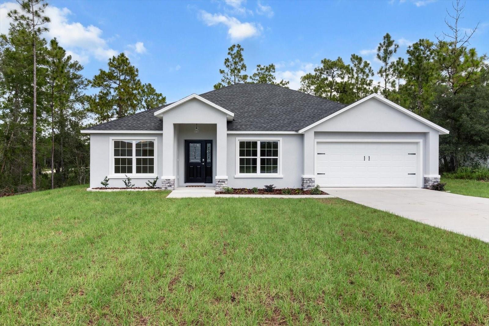 You're going to love this beautifully designed NEW CONSTRUCTION home nestled on .50 acres in Royal Highlands. Enjoy NO HOA fees & lots of privacy in this serene setting. With soaring 12 ft ceilings and an open floor plan, this 4 bedroom, 2 bath home encases warmth & simplicity with its stylish fixtures, tones & natural light. Upon entering to the left, french doors enclose a 4th bedroom, office or flex space. Formal dining to the right opens to the spacious kitchen - fully equipped with stainless steel appliances, solid wood cabinets, quartz countertops w/ an eat in bar-top, that extends right into the family room. The open concept is great for family gatherings and entertaining, while the split floor plan offers privacy. There's plenty of room to store your RV, boat or other toys, and even add a pool. High & dry, no flood zone! Located just minutes from US Hwy 19, this home offers a quick commute into Brooksville, Homosassa & Crystal River and is convenient to all major shopping & dining. Call to schedule your showing today!