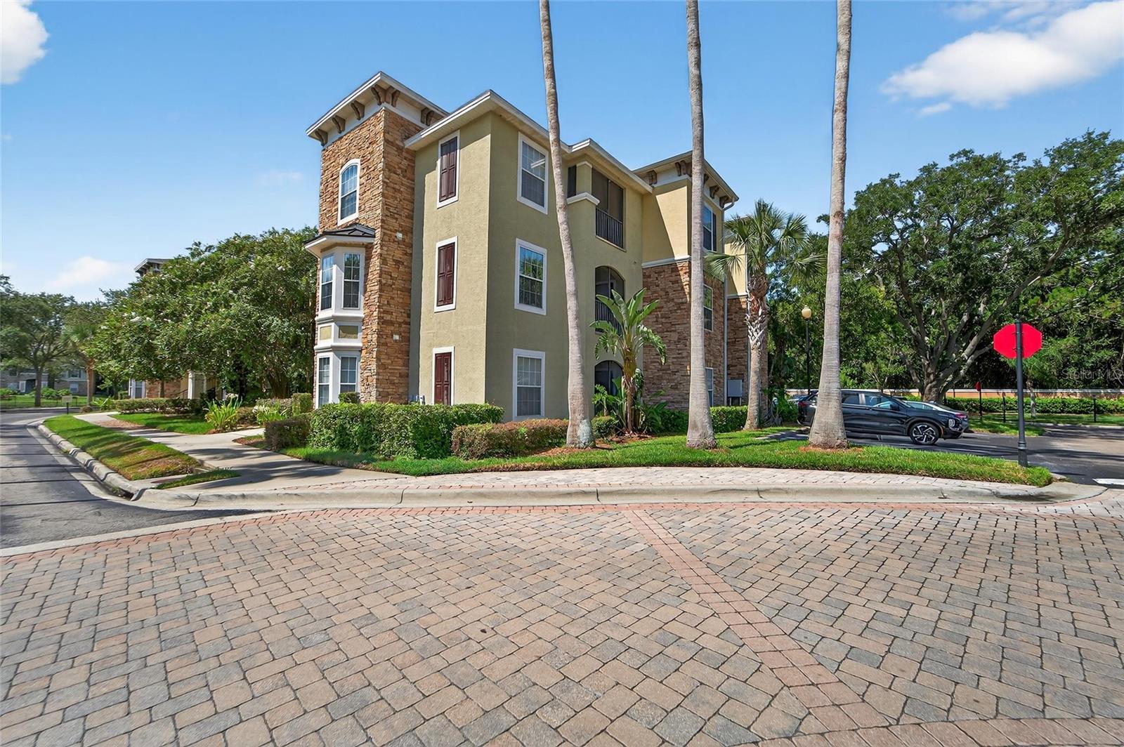 9916 COURTNEY PALMS BOULEVARD 203