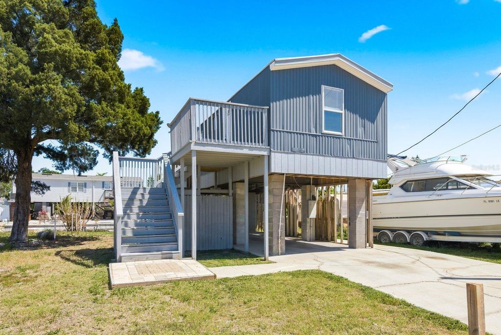 Photo of 6815 Flicker Lane, Hudson, FL 34667 (MLS # TB8502138)