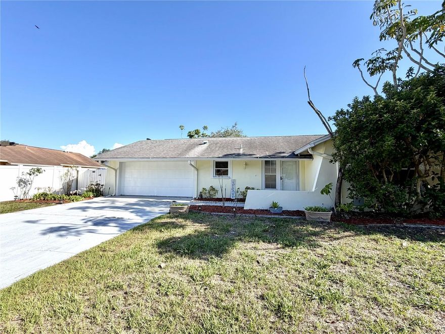 Honey LOOK!!!  Great 2 bedroom, 2 bathroom, 2 car garage pool home in Bent Tree Estates.  This home sits on a great corner lot and is built for Florida Living!  The covered screened patio and mature landscaping combined with an inground pool transforms the back yard into a private oasis with your personal touch!  Central Heat & Air system is less than 1 year old.  Kitchen appliances include newer glass top range & microwave.  New insulation was installed less than 2 years ago.  The oversized master bedroom can easily transition back to 2 smaller bedrooms if that is your preference.  The water heater is also less than 2 years old and many of the doors and windows have been "weatherized" to maximize energy efficiency.  The spacious 2 car garage has plenty of room for your vehicles AND your toys!  A new roof will be offered with a full price contract.  Pick your shingle color!!!  ALL of this in Flood Zone X AND Unincorporated Pinellas County!  This rare treasure is competatively priced and waiting for your personal touch!  Don't wait!....Schedule your private showing today!