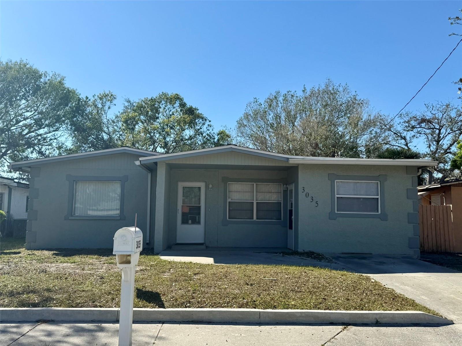 Investors and paradise seekers... check out this non-deed restricted home located within minutes to downtown Sarasota! Take one look at this 3BR + Bonus, 1BA, concrete block & stucco construction home with a large size backyard... and you'll fall in love! Perhaps one of the best values in Newtown Heights! Enjoy the home's light bright feel of natural light against the wall to wall white ceramic tile floors and the brand new carpet in bonus room! Beautifully maintained with a nicely updated kitchen boasting lots of countertop and cabinet space with newer appliances. And the bathroom's walk-in shower with single vanity sink/cabinet tops it all off perfectly! New HVAC within the last year! Non-flood Zone X, and is complete with aluminum and wood storm panels! Kick off your shoes and relax in one of Sarasota's most affordable communities! No deed or age restrictions! Located only minutes to downtown Sarasota, SRQ airport, New College, USF, Ringling Museum, theaters, beaches, shopping and restaurants. Want to have a place of your own that you can grow in? Then take a good look at the newly carpeted bonus room with it's own separate entrance door and adjoining large laundry closet. Check it out with your contractor... perhaps it may be a perfect opportunity to design and create a future income-generating studio rental! Wow! Let's talk!