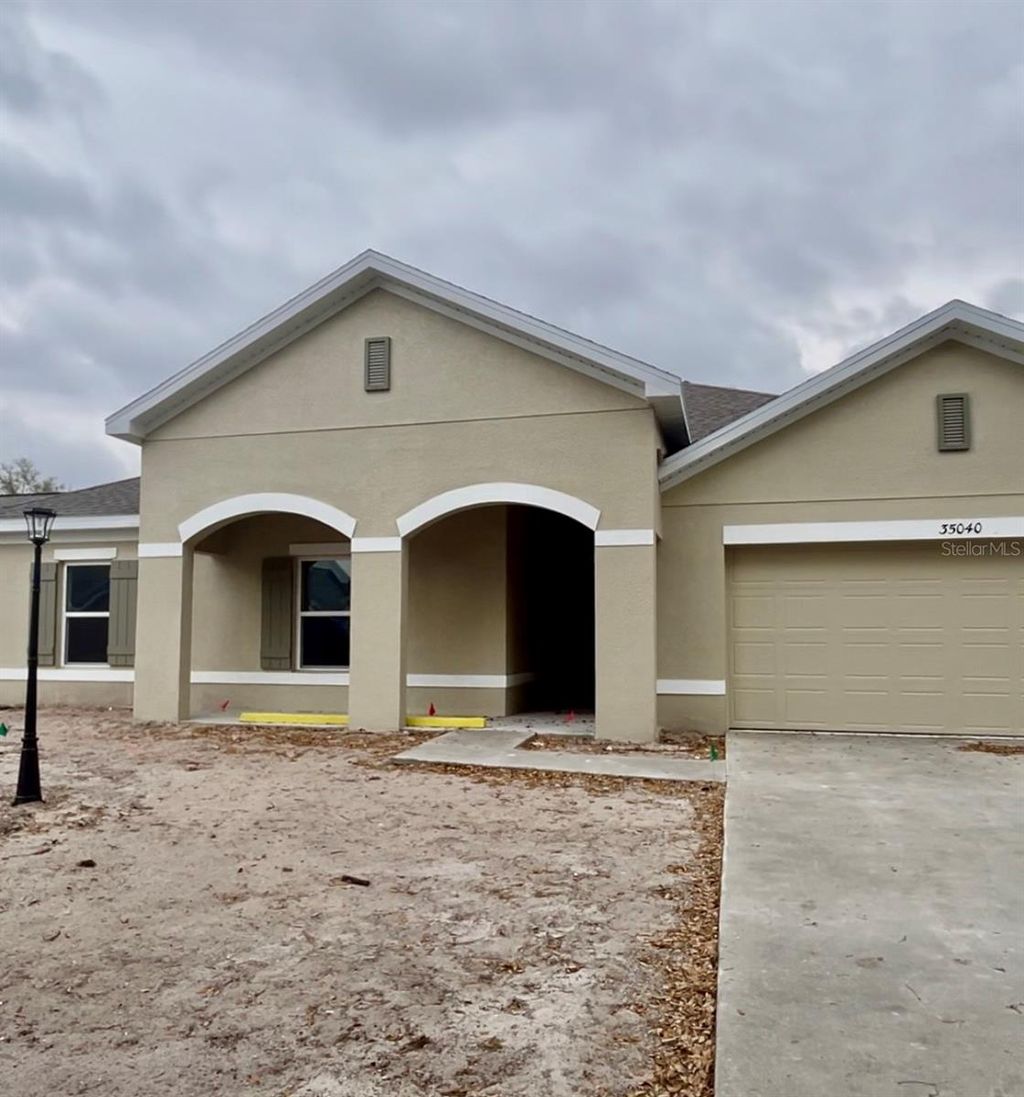 Photo of 35040 Smoketree Lane, Dade City, FL 33523 (MLS # J987363)