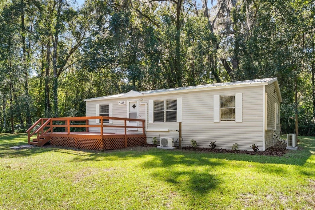 Photo of 5619 NE 79th Place, Gainesville, FL 32609 (MLS # OM734430)