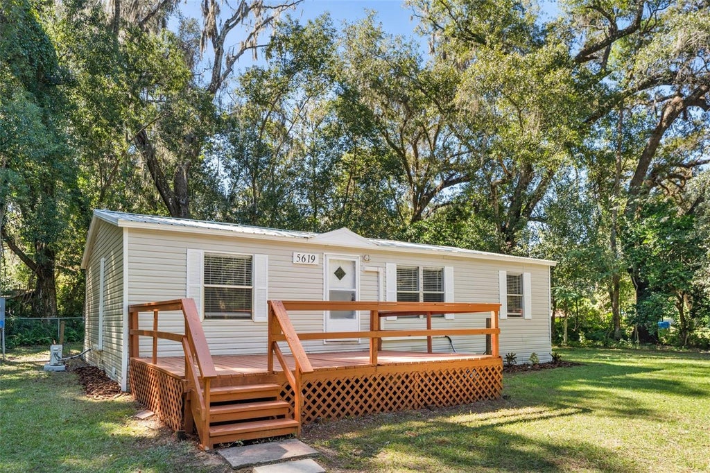 Photo of 5619 NE 79th Place, Gainesville, FL 32609 (MLS # OM734430)