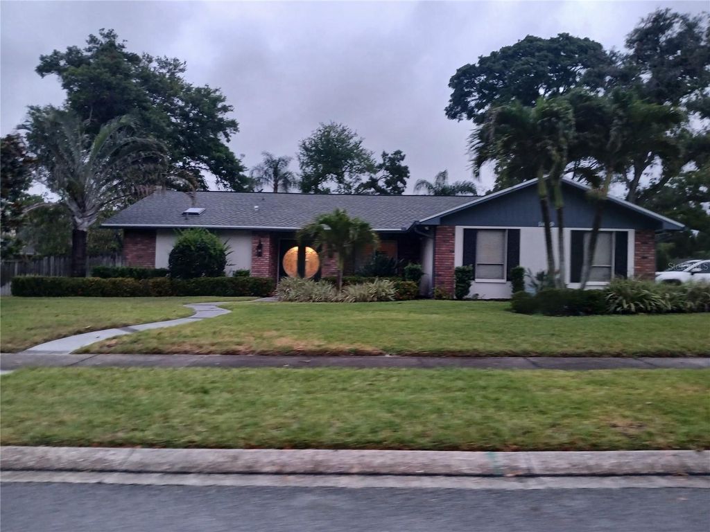 Photo of 1469 Treetop Dr, Palm Harbor, FL 34683 (MLS # TB8504484)