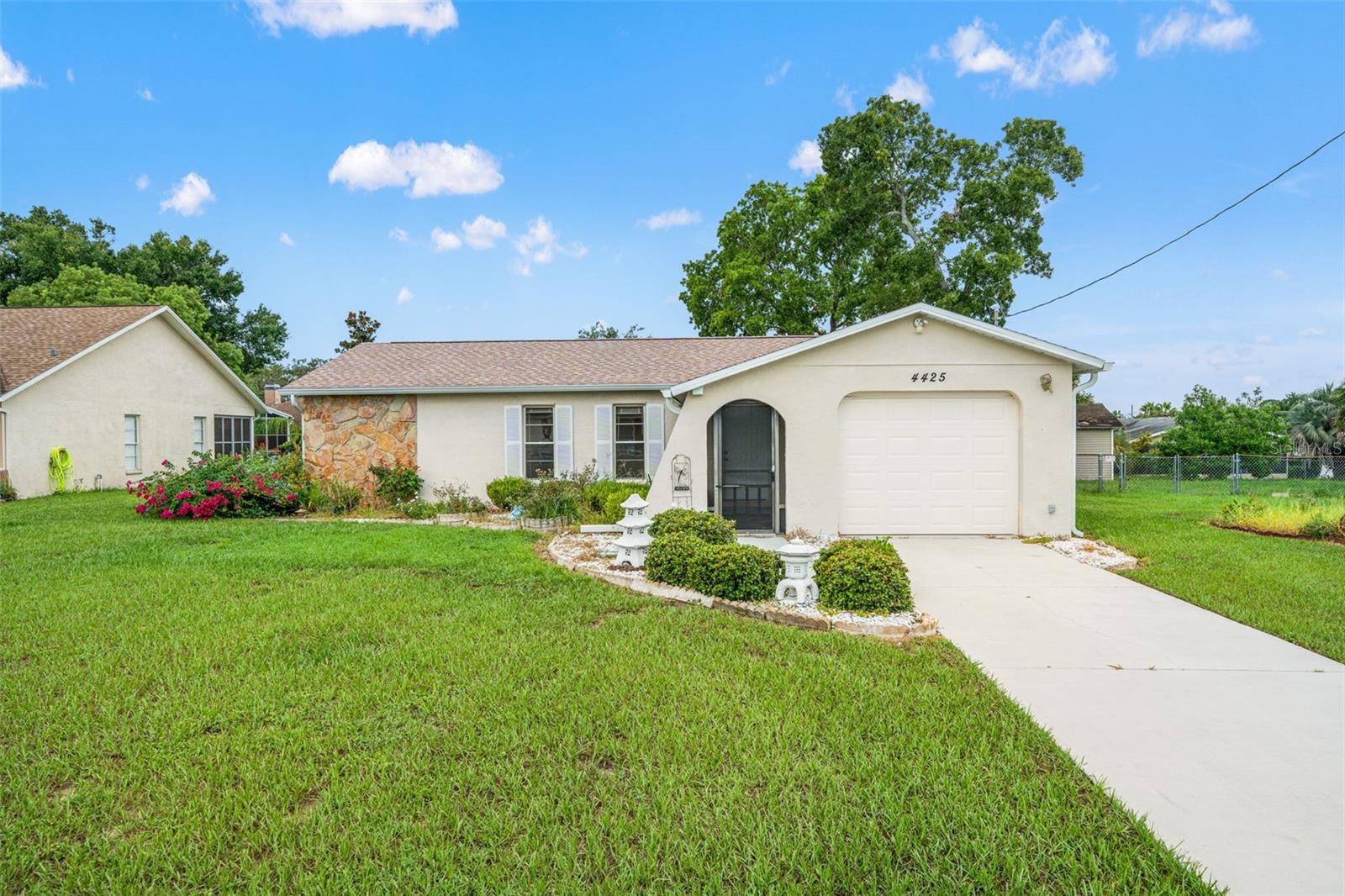 Step into this well maintained 2-bedroom, 2-bathroom gem nestled in the heart of Hernando County. With major upgrades already checked off the list—newer roof (2022), AC (2022), and water heater (2024)—you can move in with peace of mind and start living your best life! As you enter, you'll be welcomed by an abundance of natural light that fills the open living space. The living room offers a storage closet and flows seamlessly into a versatile kitchen and dining area. Need a home office, gym, or playroom? The flexible layout is ready for your personal touch! On one side of the home, enjoy the privacy of the owner's suite, complete with dual closets and a private en suite bathroom. On the opposite side, perfect for guests or family, is a spacious second bedroom and full guest bath. Head out back to your oversized screened-in lanai—ideal for morning coffee, evening unwinds, or entertaining friends. And don't miss the added storage shed for all your extras! Located just minutes from shopping, dining, parks, and all that Hernando has to offer, this home combines comfort, convenience, and charm in one perfect package. Don't miss out—schedule your private showing today and make this peaceful retreat your forever home!