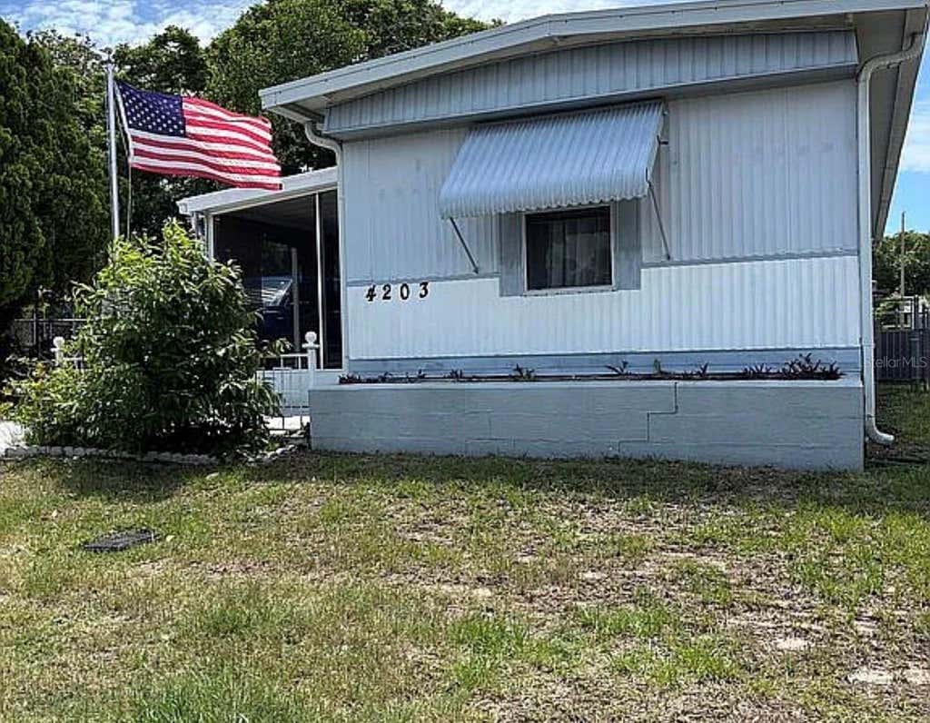 Photo of 4203 Cardoon Drive, New Port Richey, FL 34653 (MLS # J1002247)
