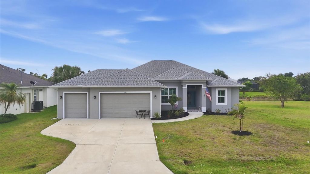 Photo of 48 Long Meadow Lane, Rotonda West, FL 33947 (MLS # D6147469)
