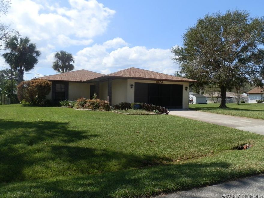 Great first time home or perfect retirement home, either way this large 2/2 needs a little TLC to make it your own.Also includes Large rooms , wood burning fire place , Brand new roof, newer appliances, and a well groomed lawn and landscaping.In the back there is also a paved drive to park your boat or RV. Located on a very quiet street in florida shores, a must see. ;Water: City