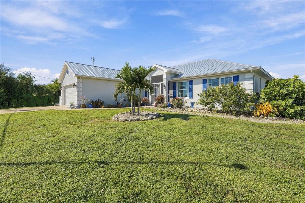 Photo of 72 Mark Twain Lane, Rotonda West, FL 33947 (MLS # D6149317)