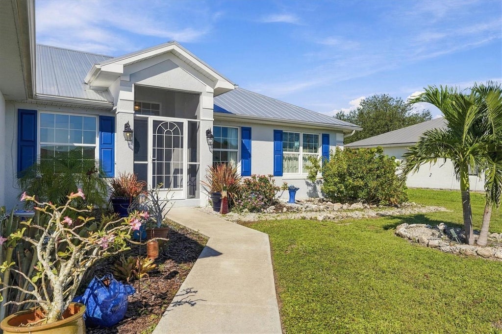 Photo of 72 Mark Twain Lane, Rotonda West, FL 33947 (MLS # D6149317)