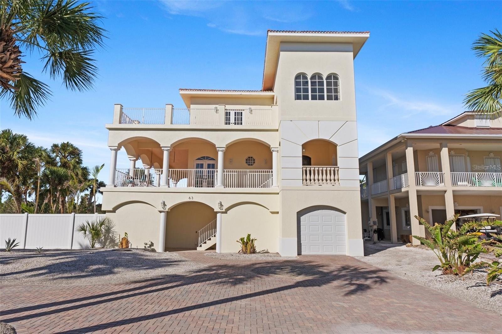 Experience island living at its finest with this stunning waterfront retreat offering direct access to the Intracoastal and the Gulf of Mexico. One of the few island homes constructed with solid concrete, this residence promises lasting durability and peace of mind—built to stand the test of time.
Drastic price reduction, below replacement cost. You cannot build a house on the island at this price point!
Set in a serene, private oasis, this home has been thoughtfully updated throughout. Step into a completely renovated, resort-style pool area designed for seamless indoor-outdoor living—perfect for both relaxing and entertaining. Expansive terraces provide breathtaking panoramic views, allowing you to fully embrace the tranquility and beauty of island life.
Inside, the home boasts four generously sized bedrooms, two full bathrooms, and two half baths. The recently updated flooring throughout gives the interior a fresh, modern look. Please check additional pictures with new flooring. The kitchen is a chef’s dream, featuring granite countertops, custom wood cabinetry, stainless steel appliances, and a beautifully upgraded island ideal for enjoying breakfast before a day of adventure.
Additional features include brand-new high-efficiency A/C units, a convenient elevator for added comfort, a brand-new jet ski lift, and a 16,000 lb. boat lift—perfect for water enthusiasts.
Enjoy access to a private beach just moments away. Spend your days paddle boarding, kayaking, or fishing off your dock, then return to your sanctuary accessible by a short ferry ride or private boat.
If you’re searching for a peaceful, luxurious escape from the hustle and bustle, look no further. This exceptional Palm Island property is your gateway to a life of sun, serenity, and sophistication.