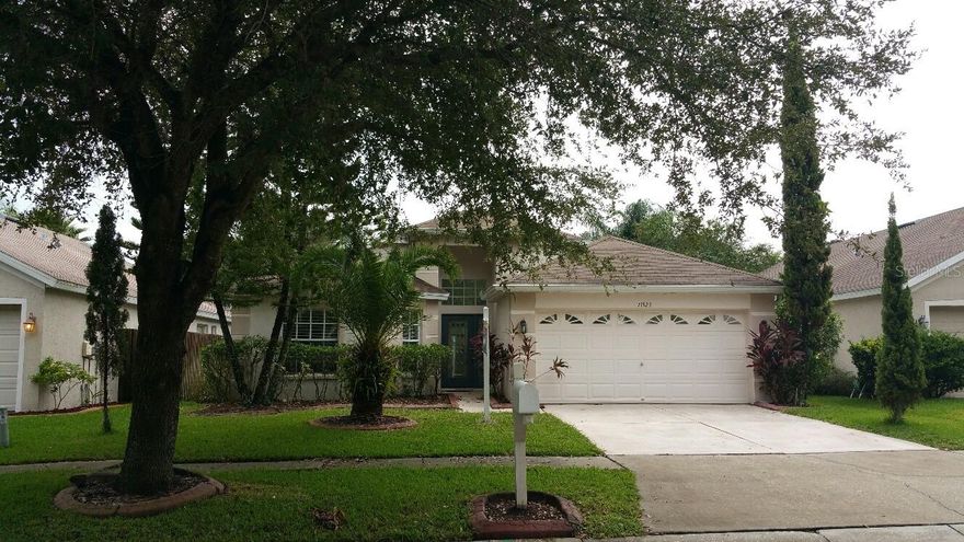 This 3 bedroom, 2 bath Home with Cathedral Ceilings has 1857 SF of living space.  The Kitchen is Light and Bright, ceramic tile name throughout with carpeting in the Family Room, Living & formal dining room.  You have a fenced backyard for privacy.  Great Location with A+ schools in a Fantastic neighborhood.  RELAX & ENJOY the community Swiming Pool, take a walk around the neighborhood or drive half a mile to Citrus Park Mall and Express Way with All the fravorite restaurants around.  For more information, a private showing, application, etc.. WE ARE HERE AND READY TO HELP.  Contact us TODAY!