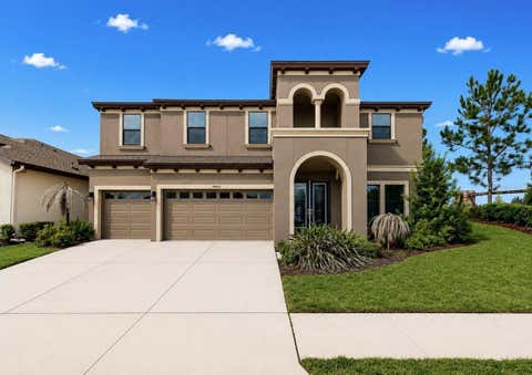 Photo of 14403 Woodland Spur Drive, Lithia, FL 33547 (MLS # TB8531550)